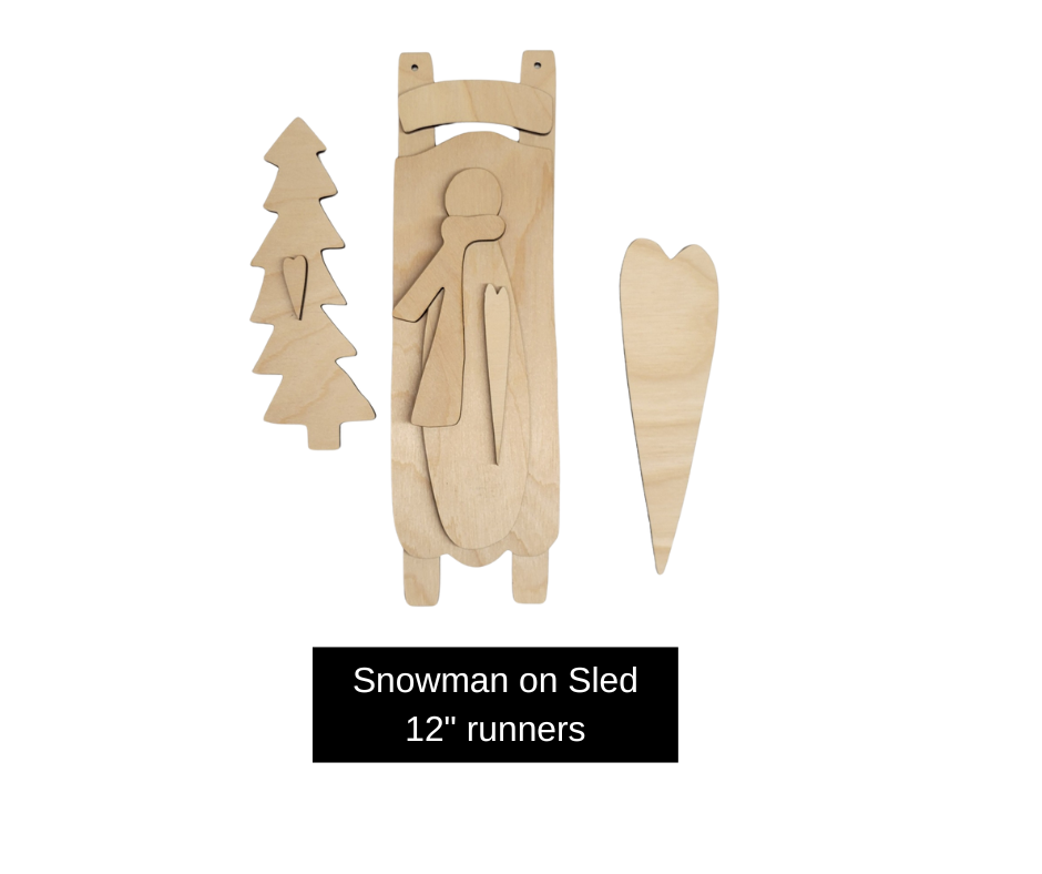 Snowman on Sled
