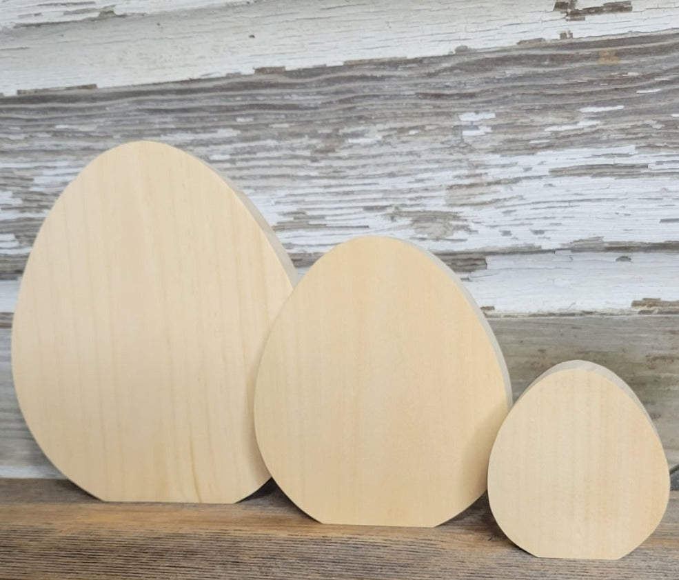 Three standing wooden eggs for crafting