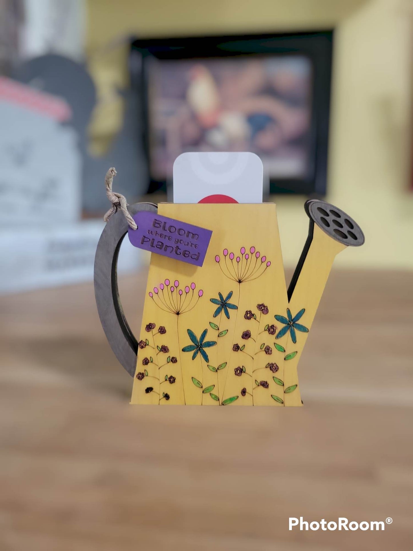 Completed painted wildflower watering can DIY kit with gift card